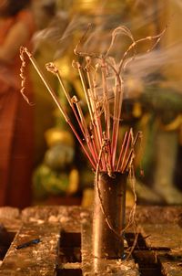 Close-up of incenses burning