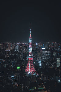 Illuminated buildings in city at night