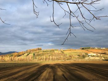 Road by land against sky