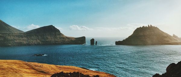 Scenic view of rocky mountains against sky