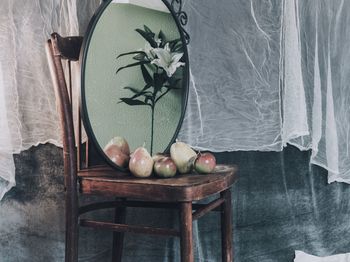 Fruits with mirror on table