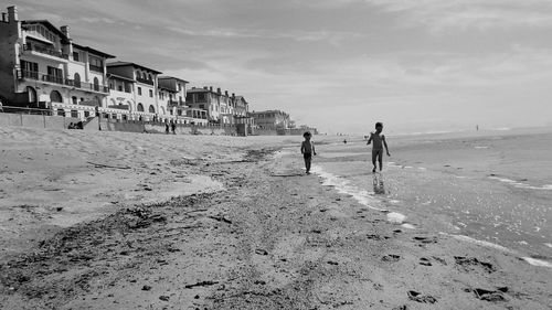 Woman standing on beach