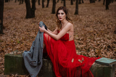 Portrait of a beautiful young woman in the field