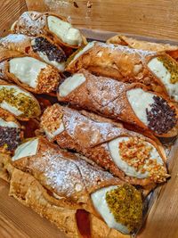 High angle view of cannoli served on table