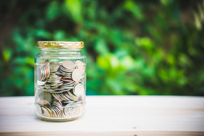 Close-up of glass jar on table