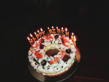 High angle view of cake on table against black background