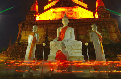 Low angle view of statue against building