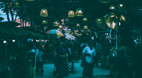 Group of people on street at night