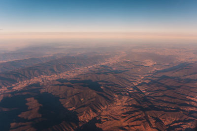 High angle view of dramatic landscape against sky