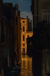 Buildings in city at night