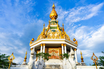 Low angle view of statue against building