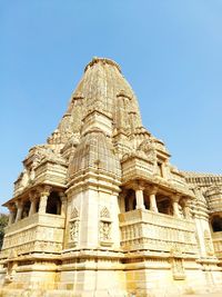 Low angle view of temple against blue sky