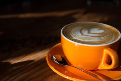Close-up of cappuccino on table