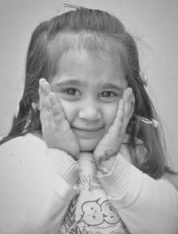 Close-up portrait of smiling girl