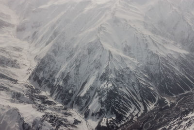 Full frame shot of snowcapped mountains during foggy weather at verbier