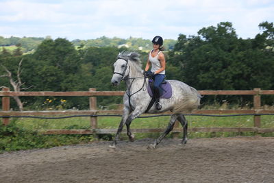 Woman riding horse