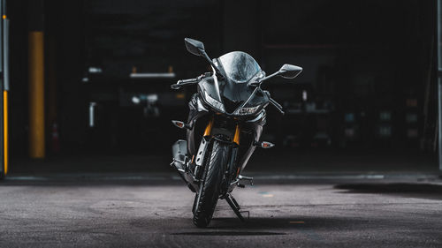 Man riding motorcycle on street in city