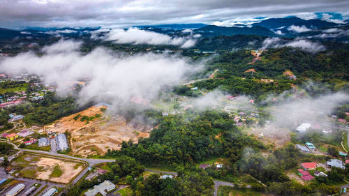 High angle view of trees on landscape against sky