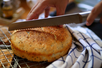 The chef slices the bread