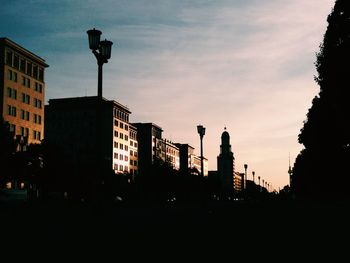 Low angle view of building against sky at dusk