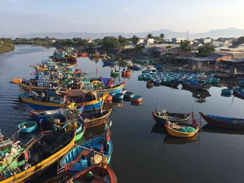 High angle view of harbor by sea against sky