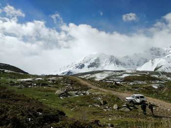 Scenic view of snowcapped mountains against sky