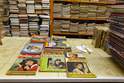 Stack of books in shelf at store