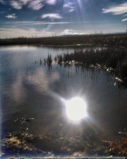 Scenic view of river against sky