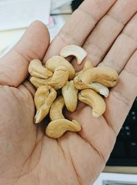 Close-up of hand holding bread