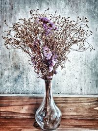 Close-up of flowering plant in vase on table