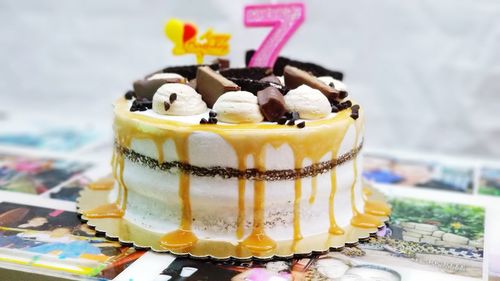 Close-up of birthday cake on table