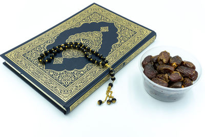 High angle view of food on table against white background