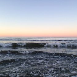 Scenic view of sea at sunset