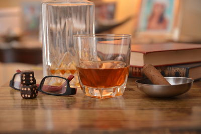 Close-up of beer glass on table