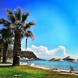 Scenic view of sea against blue sky