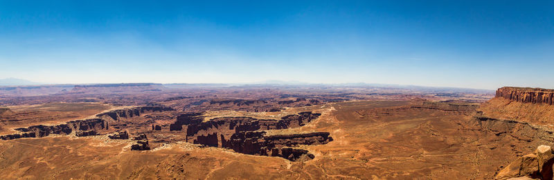 Aerial view of rock formations against sky