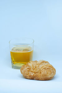 Close-up of drink against white background