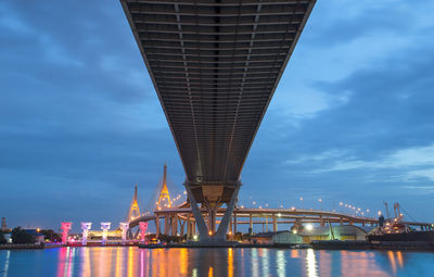 Low angle view of suspension bridge at night