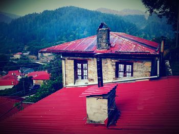 Red built structure against sky