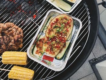 High angle view of food on barbecue grill