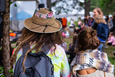 Rear view of women wearing hat