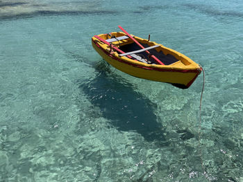 High angle view of boat moored on sea