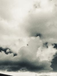 Low angle view of birds flying in sky