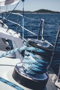 Close-up of sailboat in sea