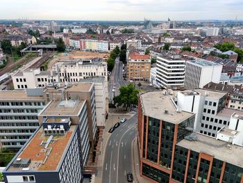 High angle view of street amidst buildings in city