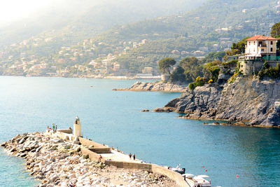 High angle view of town by sea