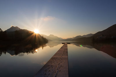 Fuschlsee in winter, wooden jetty, salzkammergut, austria.