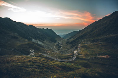 Scenic view of mountains against sky during sunset