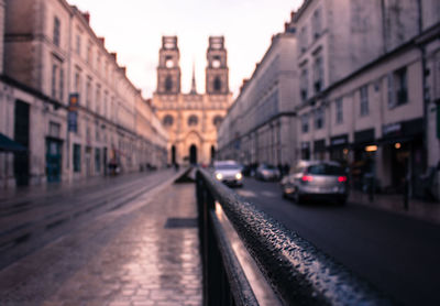 Railroad track passing through city