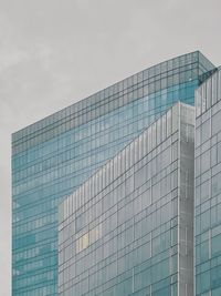 Low angle view of modern building against sky